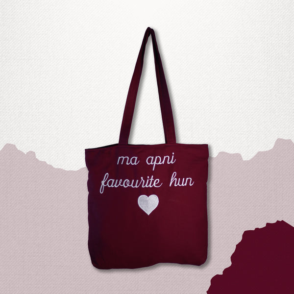 Ma Apni Favourite hun! Maroon jeans Embroidered tote bag