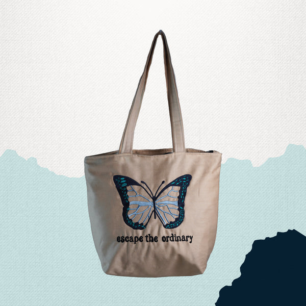 Escape the Ordinary , Butterfly Embroidered beige color jeans tote bag